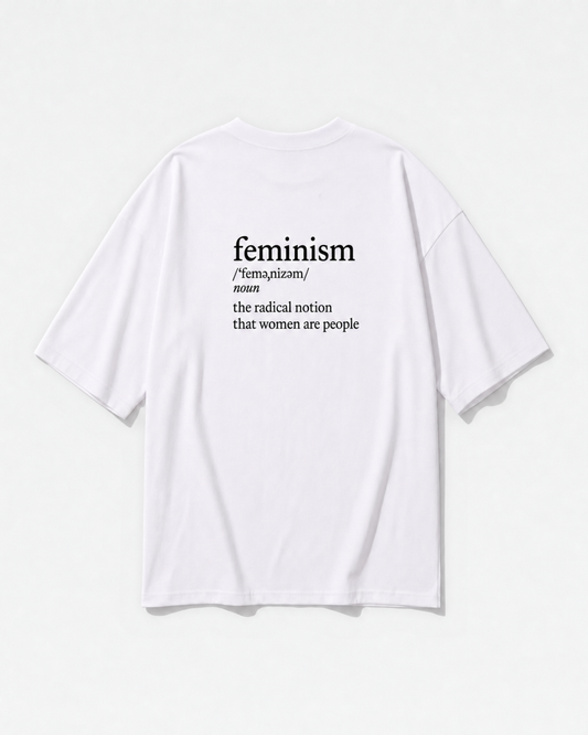 The dictionary definition of feminism printed across the back of a white oversized t-shirt by Dear India