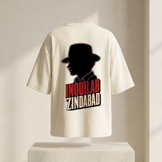 White t-shirt with black silhouette and red text on a neutral background