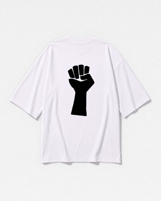 A raised fist graphic printed across the back of a white oversized t-shirt by Dear India
