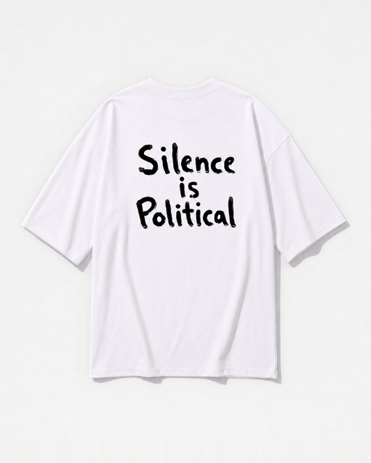 A 'Silent Politics' statement graphic printed across the back of a white oversized t-shirt by Dear India