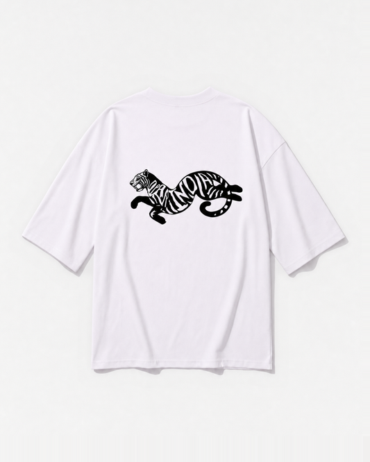 The Dear India tiger mid-leap with lettered stripes printed across the back of a white oversized t-shirt