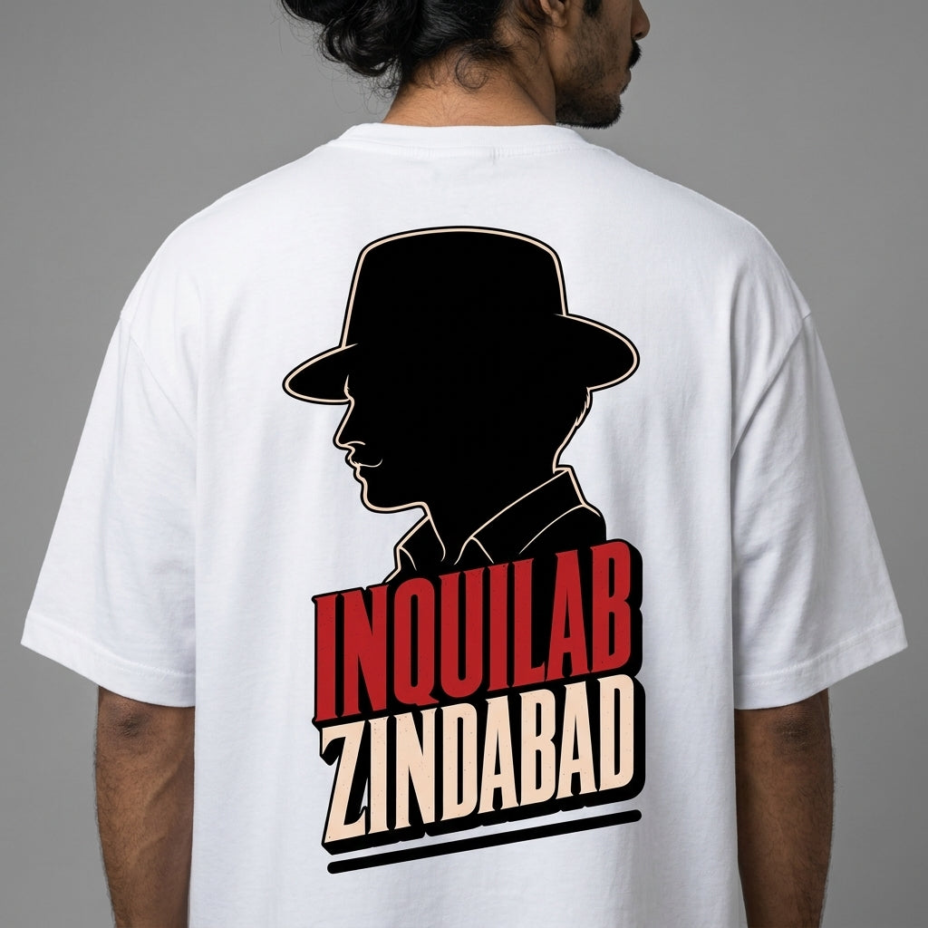 White t-shirt with a black silhouette and text on the back, worn by a person against a gray background.