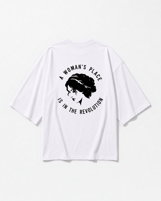 A woman's place statement graphic printed across the back of a white oversized t-shirt by Dear India